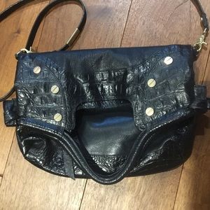 Foley & Corinna black leather gold over bag